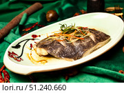 Steamed Fish Flounder at a Traditional Chinese Restaurant With Garnishes. Стоковое фото, фотограф Aleksandr Golubev / Фотобанк Лори