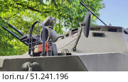Detailed CloseUp of a Military Armored Vehicle Featuring Advanced Weaponry and Systems. Стоковое видео, видеограф Vladimir Vintonjak / Фотобанк Лори