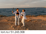 Women Selfie Beach Sunset - Two women take a selfie on a beach at sunset. Стоковое фото, фотограф svetograph / Фотобанк Лори