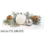 Christmas card with fir branches and Christmas decorations. Copy space. Стоковое фото, фотограф Ирина Толокновская / Фотобанк Лори
