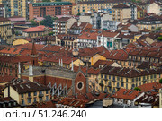Scenic aerial view of Torino architecture and buildings with tiled rooftops in Italy. Стоковое фото, фотограф Антон Гвоздиков / Фотобанк Лори