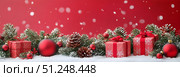 Festive Winter Decoration With Gifts and Ornaments on Red Background. Стоковое AI-изображение, AI-художник Юлия Гапеенко / Фотобанк Лори
