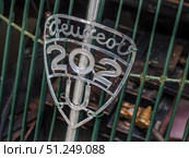 Vintage Peugeot 202 Emblem on Car Grill. Редакционное фото, фотограф Sergakoff / Фотобанк Лори
