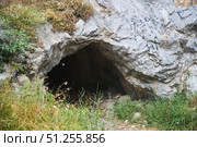 Entrance to an underground passage carved into the rock leading up to the ancient tower. Стоковое фото, фотограф Наталия Кирсанова / Фотобанк Лори
