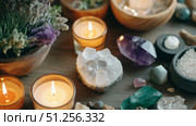 A Tranquil Arrangement of Crystals, Candles, and Fresh Herbs Creating a Serene and Calming Atmosphere for Meditation and Relaxation. Стоковое AI-изображение, AI-художник Башкирова Анна / Фотобанк Лори
