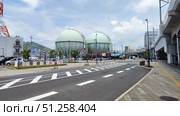 Nagasaki, Japan - May 12, 2025. Gasgolders near Nagasaki Station. Стоковое фото, фотограф Константин Никитеев / Фотобанк Лори