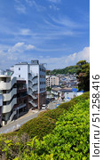 Nagasaki, Japan - May 12, 2025. Streets of Nagasaki. Стоковое фото, фотограф Константин Никитеев / Фотобанк Лори