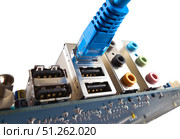 Сетевой кабель подключен к материнской плате компьютера. LAN cable is connected to the computer's motherboard. Стоковое фото, фотограф Татьяна Д / Фотобанк Лори