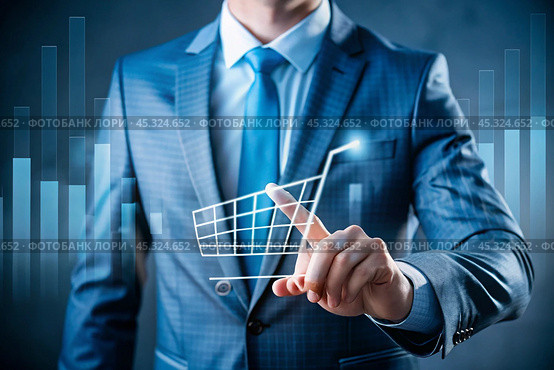 A businessman touches a virtual sales volume screen and shopping cart for a growing online sales business. A summary of the growth of online sales or the increase in the price of a grocery basket. Стоковое AI-изображение, AI-художник Photojuli / Фотобанк Лори