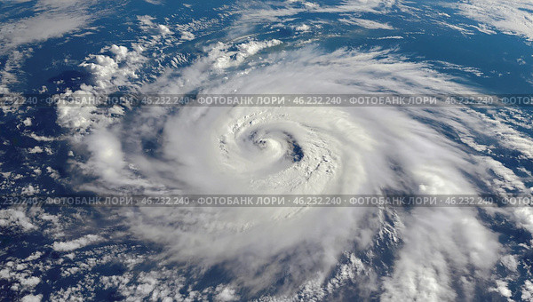 A cyclone above the surface. Illustrated photo of the cyclone. View from space, hurricane swirling over ocean, Earth’s blue surface beneath, violent winds. Стоковое AI-изображение, AI-художник Антон Слабоспицкий / Фотобанк Лори