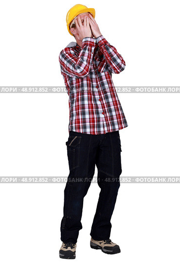 A despairing workman. Стоковое фото, агентство Ingram Publishing / Фотобанк Лори