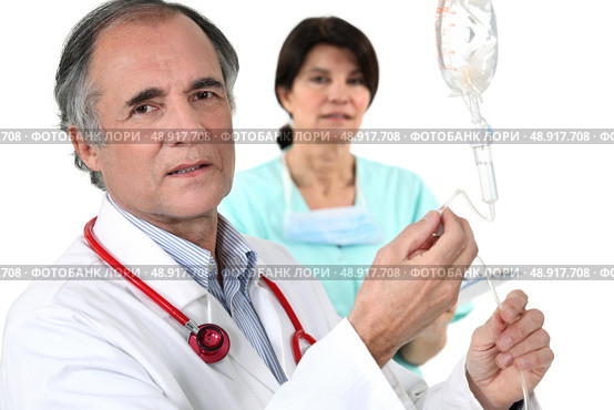 A doctor and a nurse. Стоковое фото, агентство Ingram Publishing / Фотобанк Лори