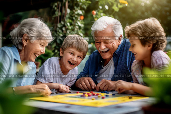 A grandparents playing board games with their grandchildren in outdoors, the joy of intergenerational communication, selective focus, shallow depth of field. Стоковое AI-изображение, AI-художник Михаил Строгалев / Фотобанк Лори
