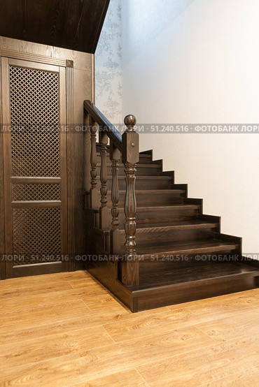 A hardwood staircase and stairwell storage. Стоковое фото, фотограф Игорь Дашко / Фотобанк Лори