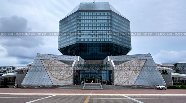 A large building with a glass dome and a lot of windows. Belarus is Minsk. 09.08.25. Редакционное фото, фотограф Ярославский Максим / Фотобанк Лори