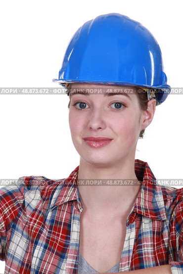 A nervous-looking tradeswoman. Стоковое фото, агентство Ingram Publishing / Фотобанк Лори