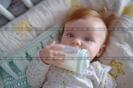 A newborn enjoys feeding while lying comfortably in a cozy nursery setting during the day. Стоковое AI-изображение, AI-художник Sergey Grishin / Фотобанк Лори
