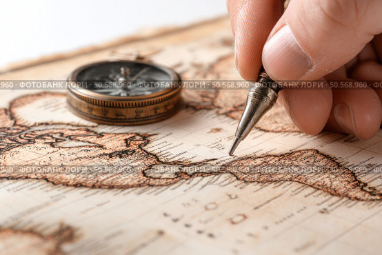 A person is writing on a map with a compass. Стоковое AI-изображение, AI-художник Ярославский Максим / Фотобанк Лори