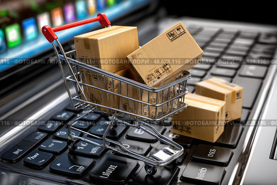 A shopping cart is on a laptop keyboard with boxes on it. Стоковое AI-изображение, AI-художник Ярославский Максим / Фотобанк Лори