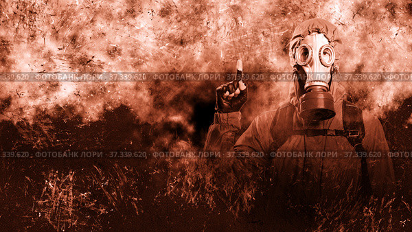 A shot of a man dressed in a gas mask, a jacket with a hood, a backpack, points his index finger up, looks into the camera. A poster on the background of grunge. Стоковое фото, фотограф Владимир Арсентьев / Фотобанк Лори