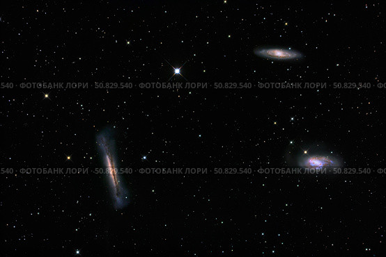 A small group of galaxies known as the Leo Triplet. Стоковое фото, фотограф Roth Ritter/Stocktrek Images / ТАСС / Фотобанк Лори