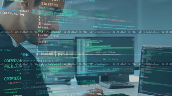 A software developer analyzes code and data in a contemporary office setting. Стоковое AI-видео, аниматор Данила Большаков / Фотобанк Лори