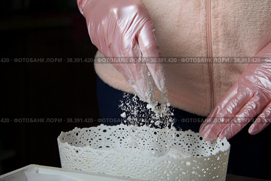 A woman mixes dextrose with powdered sugar. For processing marshmallows. Homemade zephyr. Стоковое фото, фотограф Vadzim Yakubovich / Фотобанк Лори