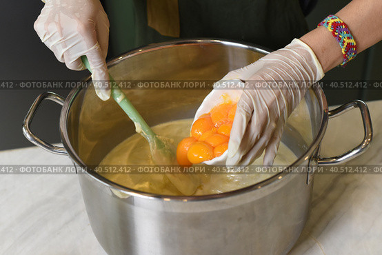 A woman stirring yolk for baking. Стоковое фото, фотограф Татьяна Терехина / Фотобанк Лори