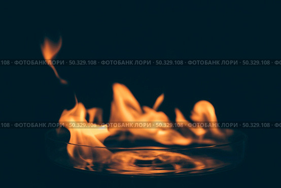 abstract fire flames black backdrop. High resolution photo. abstract fire flames black backdrop. High quality photo. Стоковое фото, агентство Ingram Publishing / Фотобанк Лори