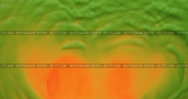 Абстрактный фон. Рябь и волны зеленой флуоресцентной краски. Вид сверху. Abstract background. Ripples and waves of green fluorescent paint. Стоковое видео, видеограф Александр Собко / Фотобанк Лори