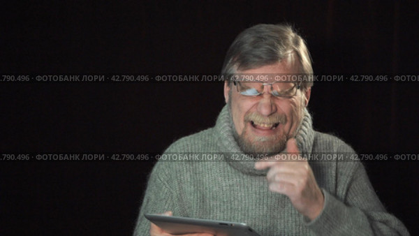 Adult man with a beard. The expression of the emotions of laughter. Стоковое видео, видеограф EStarodubov / Фотобанк Лори
