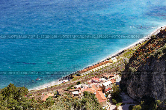 Aerial breathtaking view of Giardini Naxos railway station, shore of Ionian sea (2019 год). Стоковое фото, фотограф Ирина Мойсеева / Фотобанк Лори