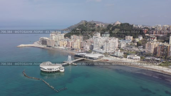 Aerial photo of Adriatic sea shore in Durres, Albania. Ventus Harbor visible from above. Стоковое видео, видеограф Яков Филимонов / Фотобанк Лори