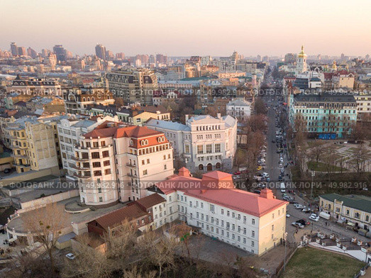 Aerial photography from the drone to the National Sanctuary Complex Kyiv Sophia and other historical places in Kiev, Ukraine, a shot at sunset in the summer.. Panoramic aerial view from the drone, a view of the bird’s eye view of the the central historical part of the city of Kiev, Ukraine, with old buildings of the city. Стоковое фото, агентство Ingram Publishing / Фотобанк Лори