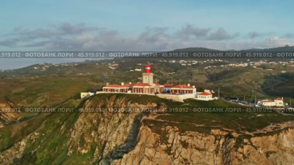 Aerial view of lighthouse at Cape Roca in Portugal (2019 год). Стоковое видео, видеограф Михаил Коханчиков / Фотобанк Лори