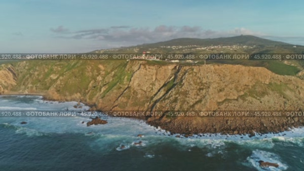 Aerial view of lighthouse at Cape Roca in Portugal (2019 год). Стоковое видео, видеограф Михаил Коханчиков / Фотобанк Лори