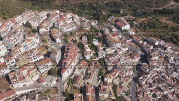 Aerial view of Ojen, white village over a hillside near Marbella, Spain in the spring. Стоковое видео, видеограф Яков Филимонов / Фотобанк Лори