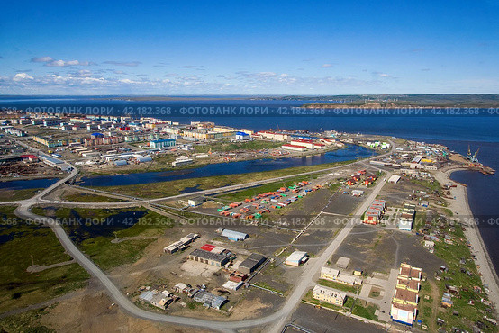 Aerial view of Tavayvaam village (on the right) and Anadyr city (on the left behind the Kazachka river). Chukotka settlements in the far north of Russia. Anadyr estuary and vast expanses of Siberia. Стоковое фото, фотограф Андрей Степанов / Фотобанк Лори