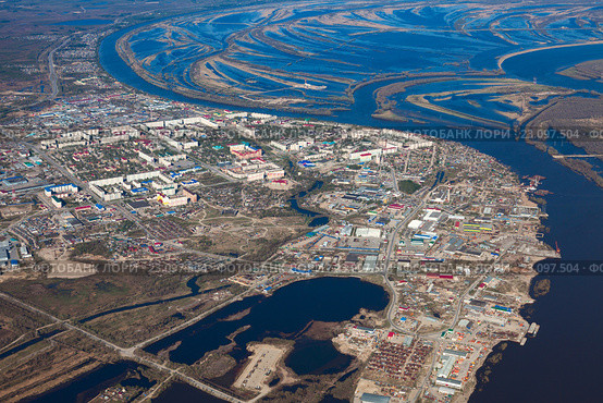 Aerial View of town on the bank river. Стоковое фото, фотограф Владимир Мельников / Фотобанк Лори