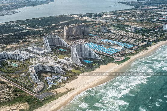 Aerial view photo of Nha Trang and Cam Ranh Resort Shorelines, Beach, sea, and Hotels. resort coast of vietnam. Стоковое фото, фотограф Павел Муравьев / Фотобанк Лори