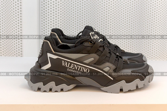 Alentino sneakers in a luxury fashion store showroom. Редакционное фото, фотограф Татьяна Васильева / Фотобанк Лори