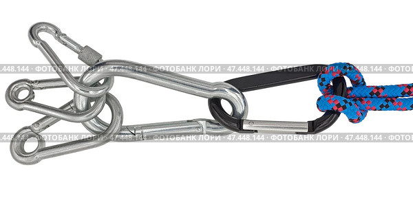 Альпинистские карабины на белом фоне. Climber carabiners on a white background. Стоковое фото, фотограф Татьяна Д / Фотобанк Лори