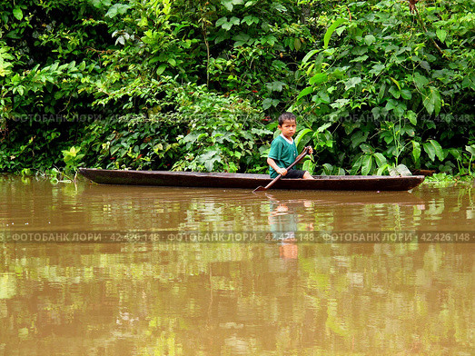 Amazon river, Peru - 12 May 2011: The boat in Amazon river in Peru, South America. Редакционное фото, фотограф Сергей Стрелков / Фотобанк Лори