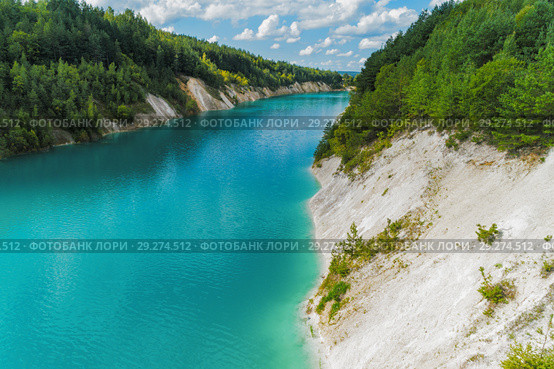 An old gypsum quarry filled with blue and pure water. Aerial view, from top to bottom. Стоковое фото, фотограф Андрей Радченко / Фотобанк Лори
