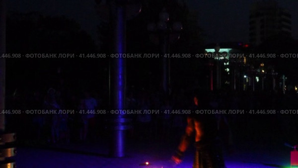 Anapa, Russia, 10.14.23 Fakir show. Fiery performance. Torches in hands. Unforgettable impression. A handsome muscular man takes a flammable liquid into his mouth and creates a large flame by spitting. Редакционное видео, видеограф Юлия Петровская / Фотобанк Лори