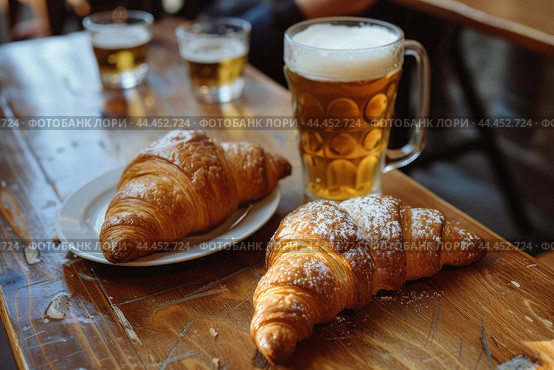 Appetizing Croissants on wooden board near the beer glasses. Generate ai. Стоковое AI-изображение, AI-художник Иван Рябоконь / Фотобанк Лори
