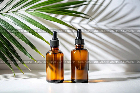 Aromatherapy. A glass bottle with a pipette for oil, lotion and palm leaves on a concrete background. Natural organic eco-cosmetics. The layout of the corporate identity of the beauty salon. Стоковое AI-изображение, AI-художник Photojuli / Фотобанк Лори