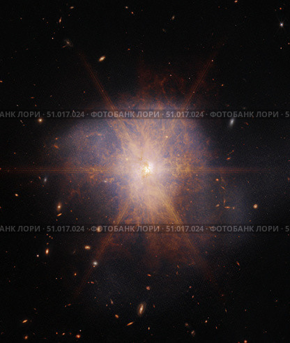 Arp 220 lights up the night sky 250 million light-years away in the constellation of Serpens. Стоковое фото, фотограф Stocktrek Images, Inc. / ТАСС / Фотобанк Лори