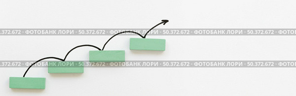 arrow bouncing up off block . Стоковое фото, агентство Ingram Publishing / Фотобанк Лори