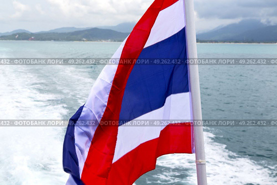 asia myanmar kho samui bay isle waving flag    in thailand and south china sea . Стоковое фото, агентство Ingram Publishing / Фотобанк Лори